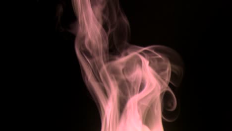 сhocolate smoke rising graceful twists upward. colored smoke blowing from bottom to top. close-up, isolated on black background