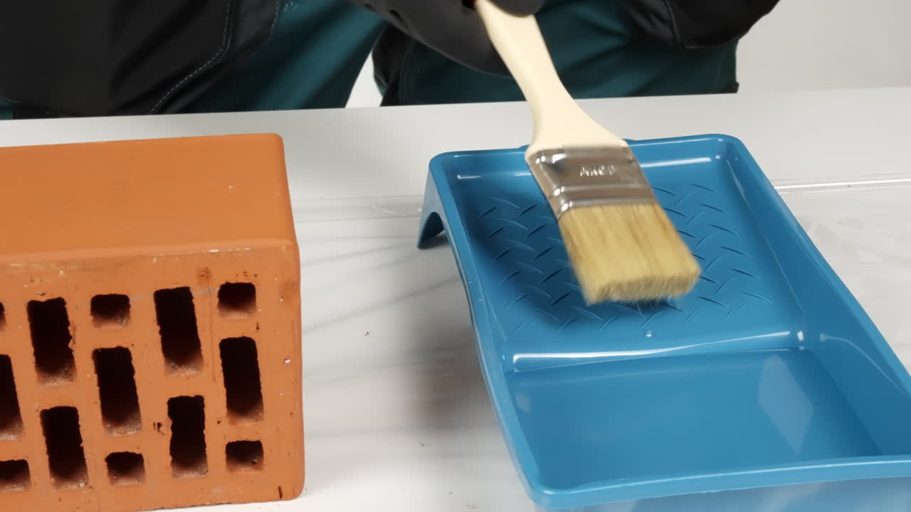Applying protective coating to brick