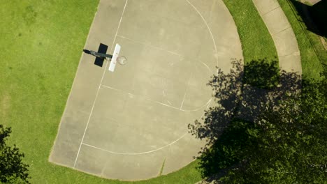 empty asphalt basketball court