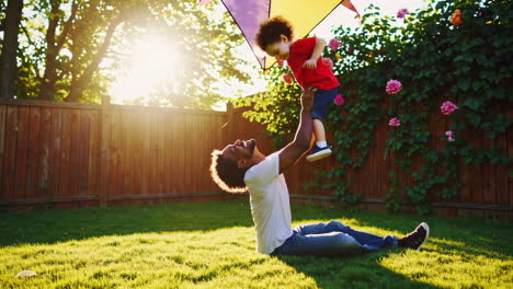 father and son playing in the backyard
