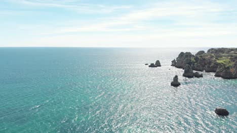 Atlantic-Ocean-and-rocky-Algarve-coastline-on-sunny-breezy-day