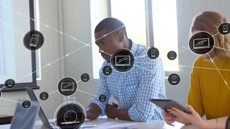 Digital Network Connecting Business People Working in a Modern Office