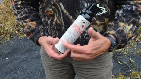 A-closeup-shot-of-a-can-of-bear-spray-that-can-be-used-for-self-defense-from-a-grizzly-bear-brown-bear-kodiak-bear-attack-on-Kodiak-Island-Alaska