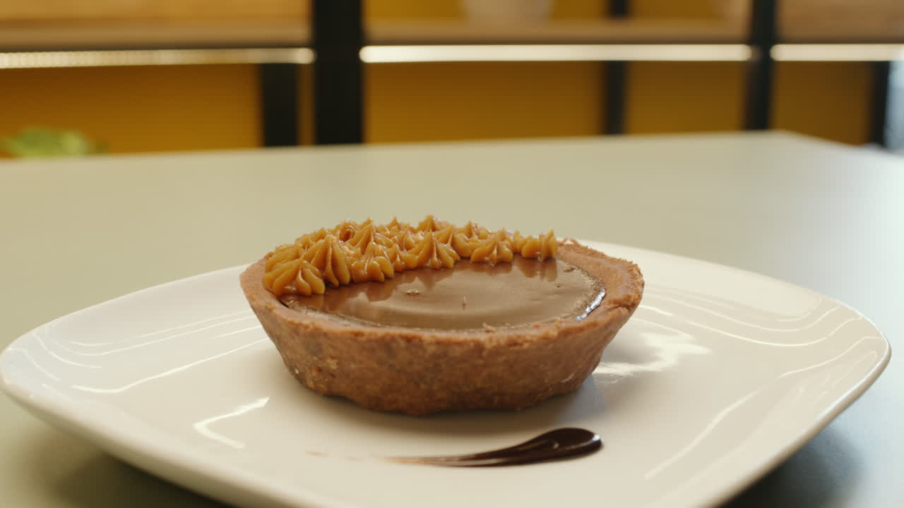 Soft panning showing a chocolate and fudge cake, with appetizing texture and detail