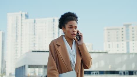 businesswoman on a phone call in a city