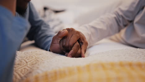 Closeup,-home-and-couple-holding-hands