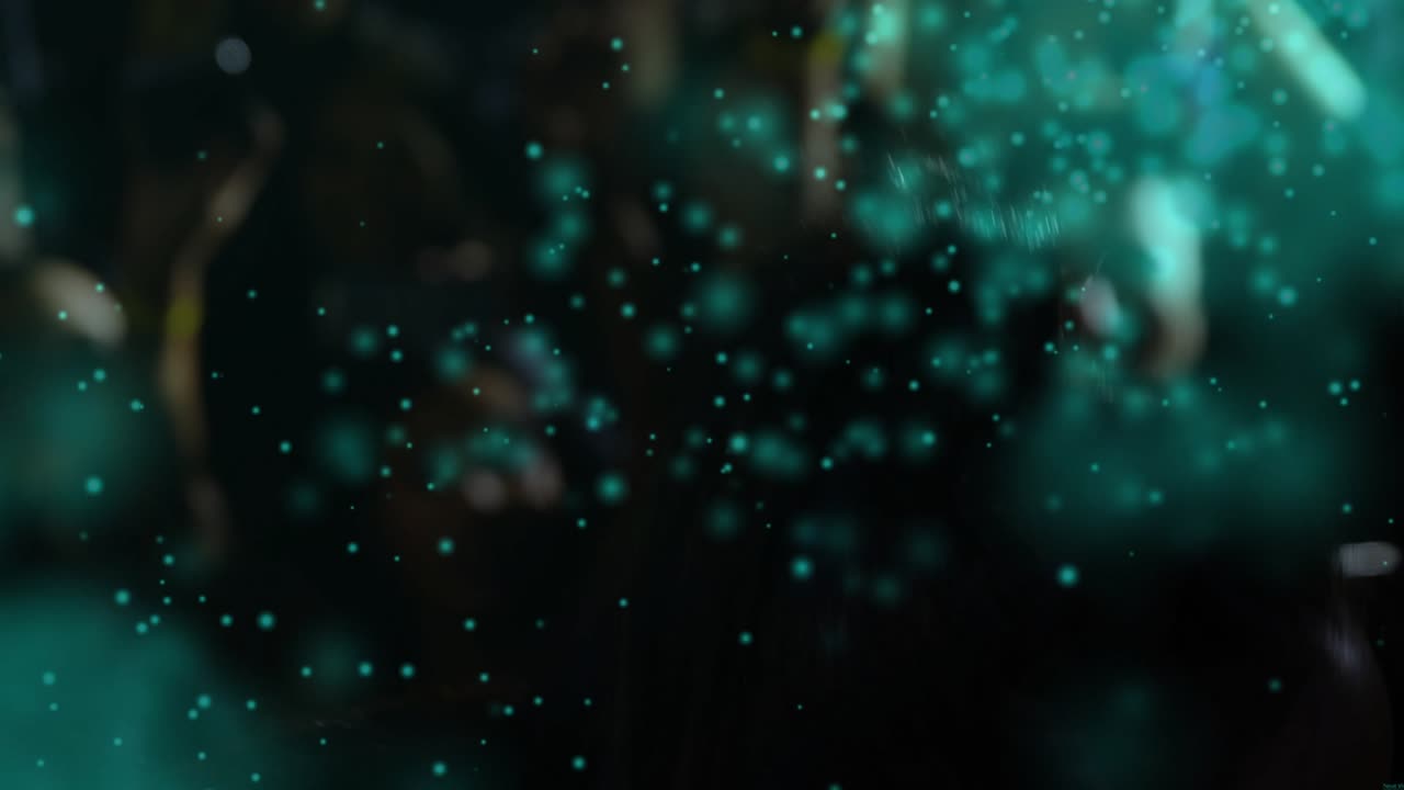 Cam moving closer as singer bringing mic, addressing music crowd, teal lights drifting in front