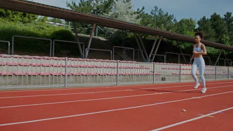 woman running on a track