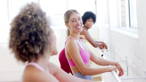 three women are enjoying yoga pilates class together