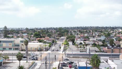crenshaw neighbourhood suburban homes palm tree streets aerial rising view