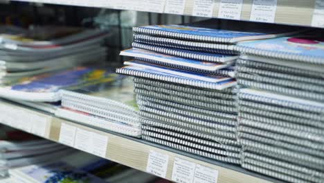 Vinnitsa, Ukraine - August, 2018: Back to school concept. Purchase of stationery in the store. Close-up.