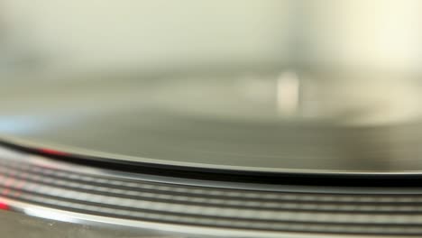 spinning vinyl record close up - vintage lp player playing music