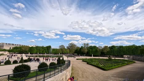 visitors enjoying a sunny day in paris