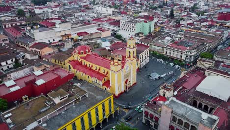 aerial drone tilt up shot over metropolitan cathedral of the immaculate conception of xalapa, xalapa city, veracruz, mexico at daytime