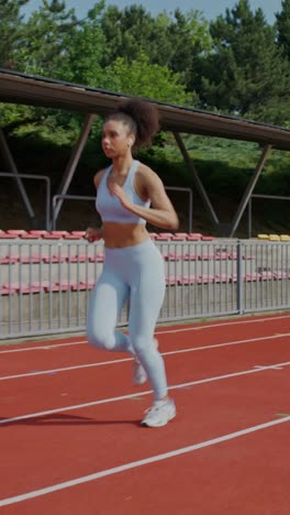 woman running on a track