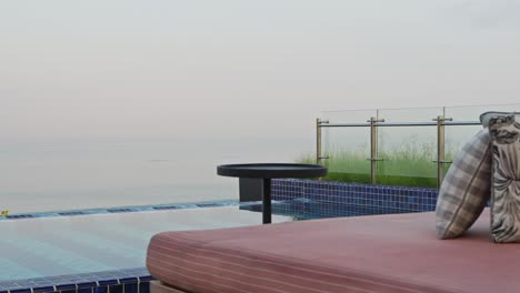 cushions-sit-on-pool-lounger-of-rooftop-pool
