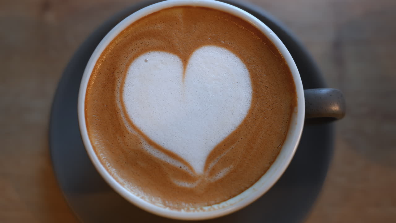 Top down shot of foam latte art on coffee