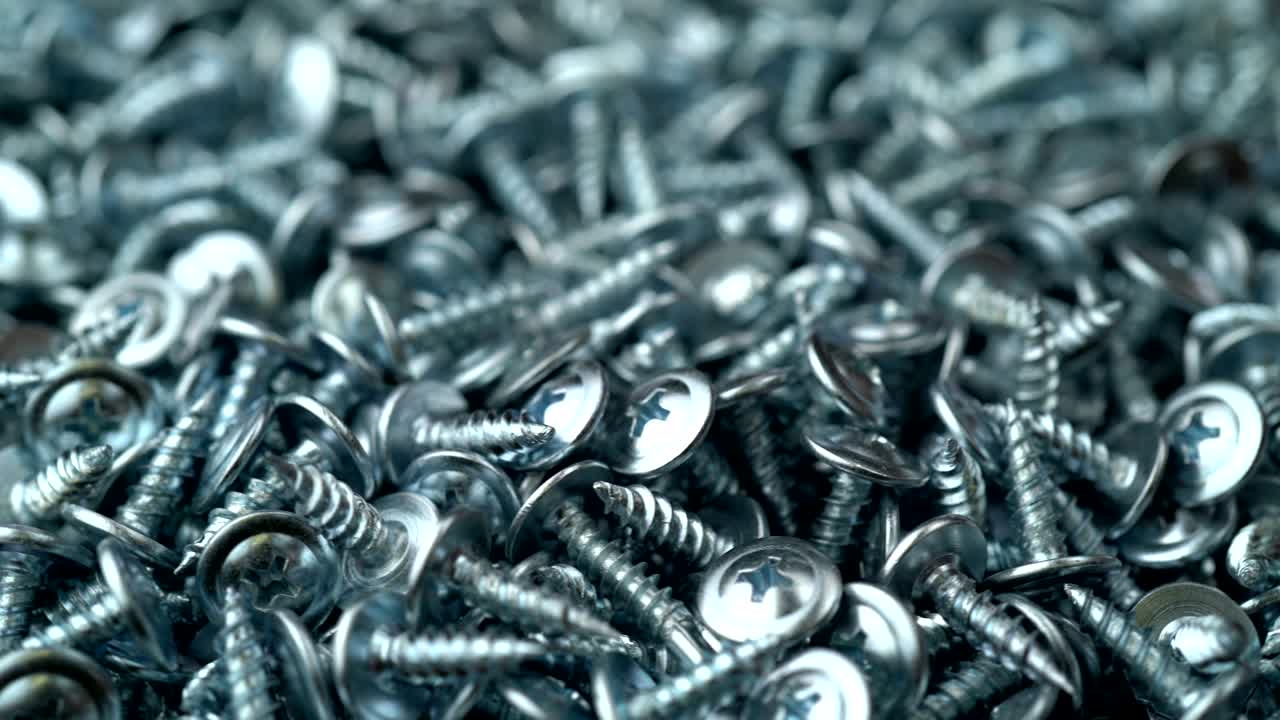 muchos tornillos de auto-tapeo rotan el fondo de movimiento