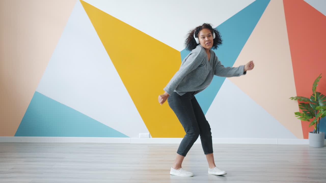 Woman Dancing to Music