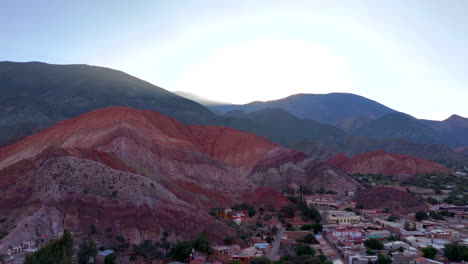 purmamarca seen from above with a drone during a sunset amidst the andes mountains