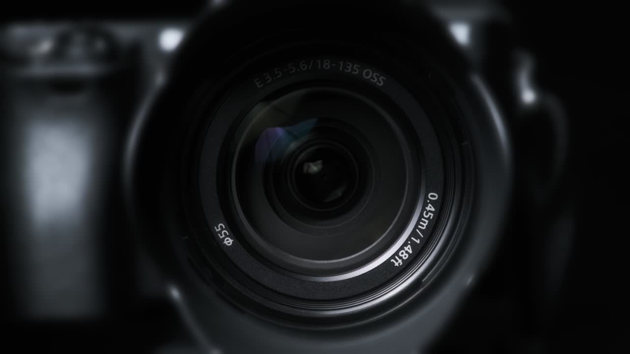 The Camera Lens Rotates, Lights Reflecting Off Glass, Robotic Camera Movement