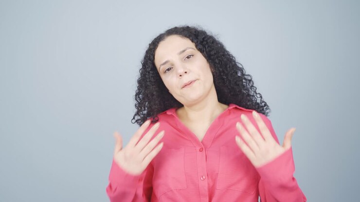 The high air temperature is suffocating the young woman.