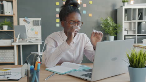 woman working on laptop in office