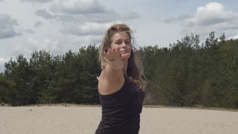 beautiful woman exercising yoga doing warrior pose