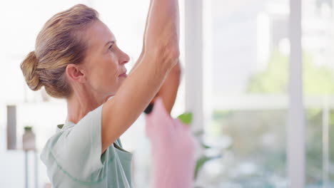 Active-senior-woman-meditating-during-a-fitness