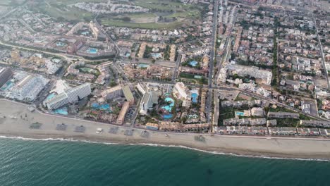 aerial-footage-of-the-beautiful-coast-of-roquetas-de-mar-at-spains-mediterrean,-filmed-by-drone