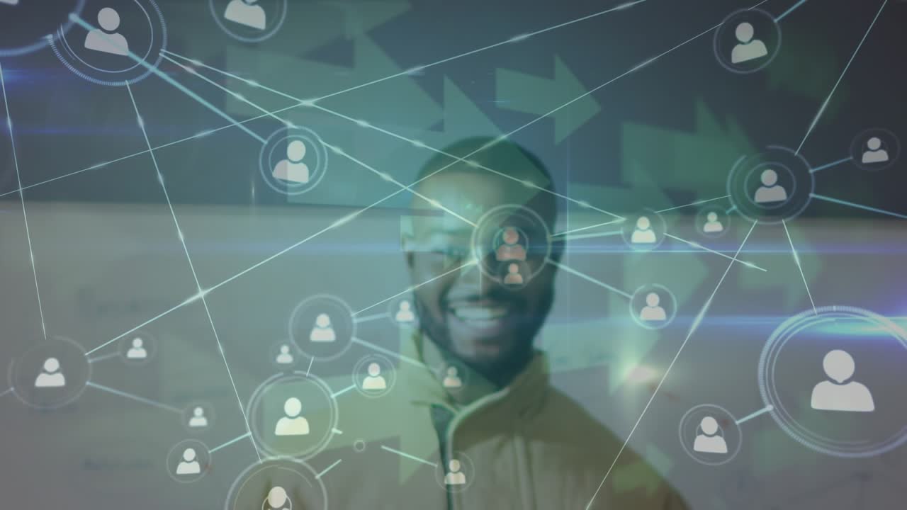 Animation of network of connections with icons and arrows over african american male teacher