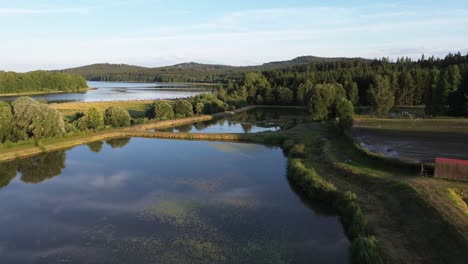 a view a short distance above the wide blue river and the coast which separates it from the mainland