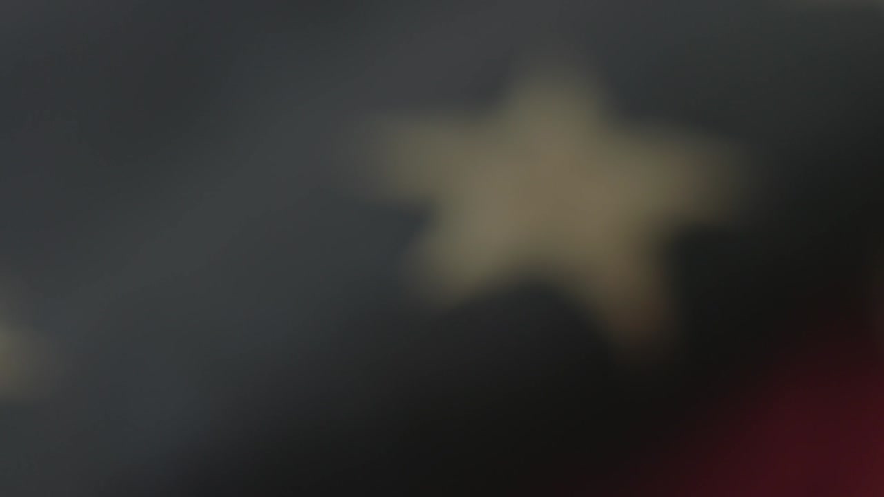 Detail of American flag with 13 stars of the revolution