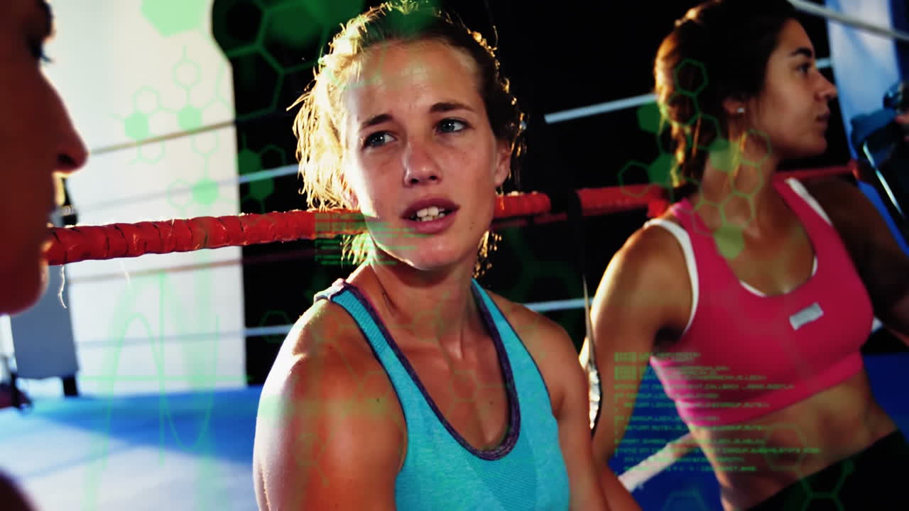 Training partners leaning against ropes in boxing ring catching breath with fitness data overlays