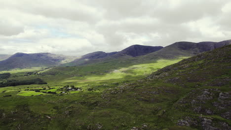 beautiful ireland aerial of highlands with grass covered