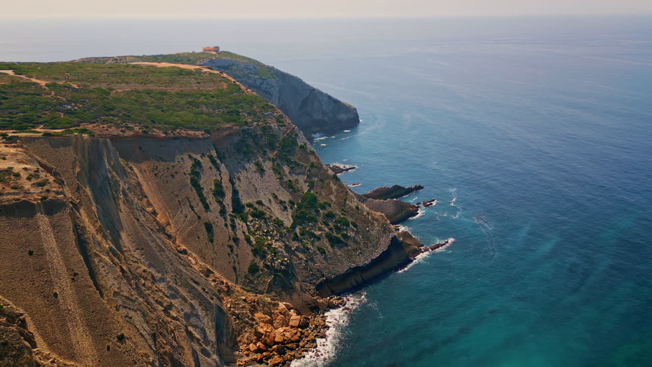 Aerial spectacular rocky coast at  summer morning. Picturesque ocean