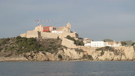 traveling from the water in the old town of ibiza, spain