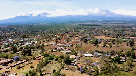 rural village town of kenya with kilimanjaro in the background