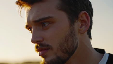 horse running in sunset field and young man portrait
