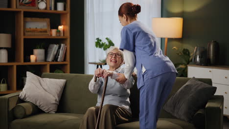 elderly woman receiving care from caregiver at home