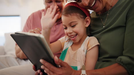 Family,-video-call-and-child-wave-to-tablet