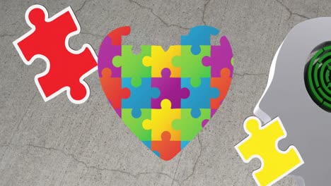 Animation-of-colourful-puzzle-pieces,-autism-awareness-month-text