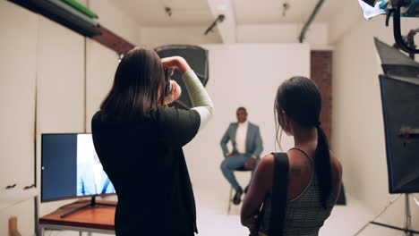 a behind-the-scenes look at a professional photography studio photoshoot