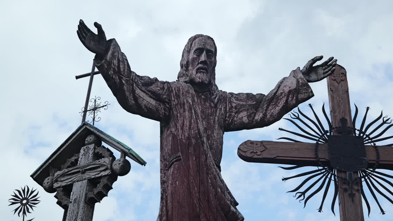 Slow motion sacred statue scene expressing faith devotion and history Lithuania