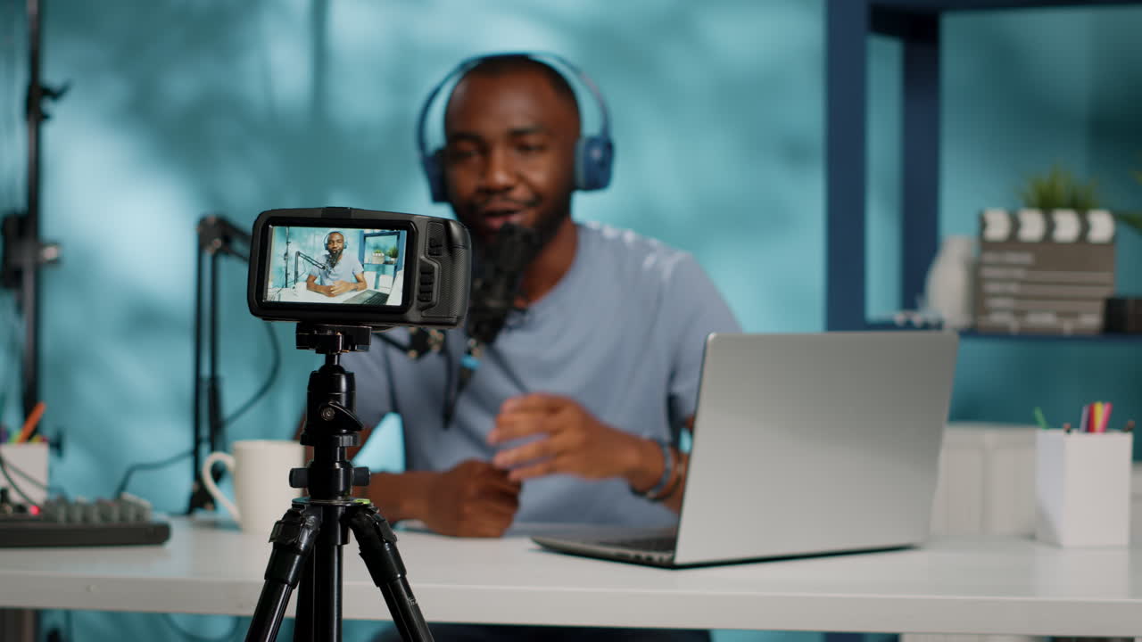 Close up of content creator recording video on camera