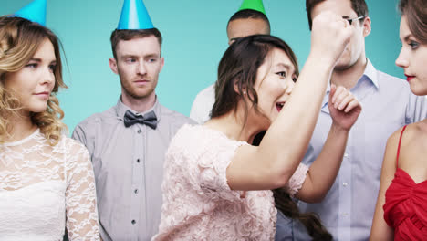 Geek-girl-dancing-for-group-of-people-slow-motion-party-photo-booth