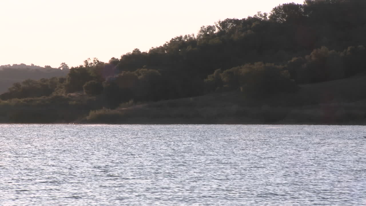 Eight person rowing sweep and double scull on Lake Casitas in Oak View California