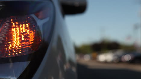 The-camera-moves-along-the-front-of-a-car-to-reveal-headlights-1