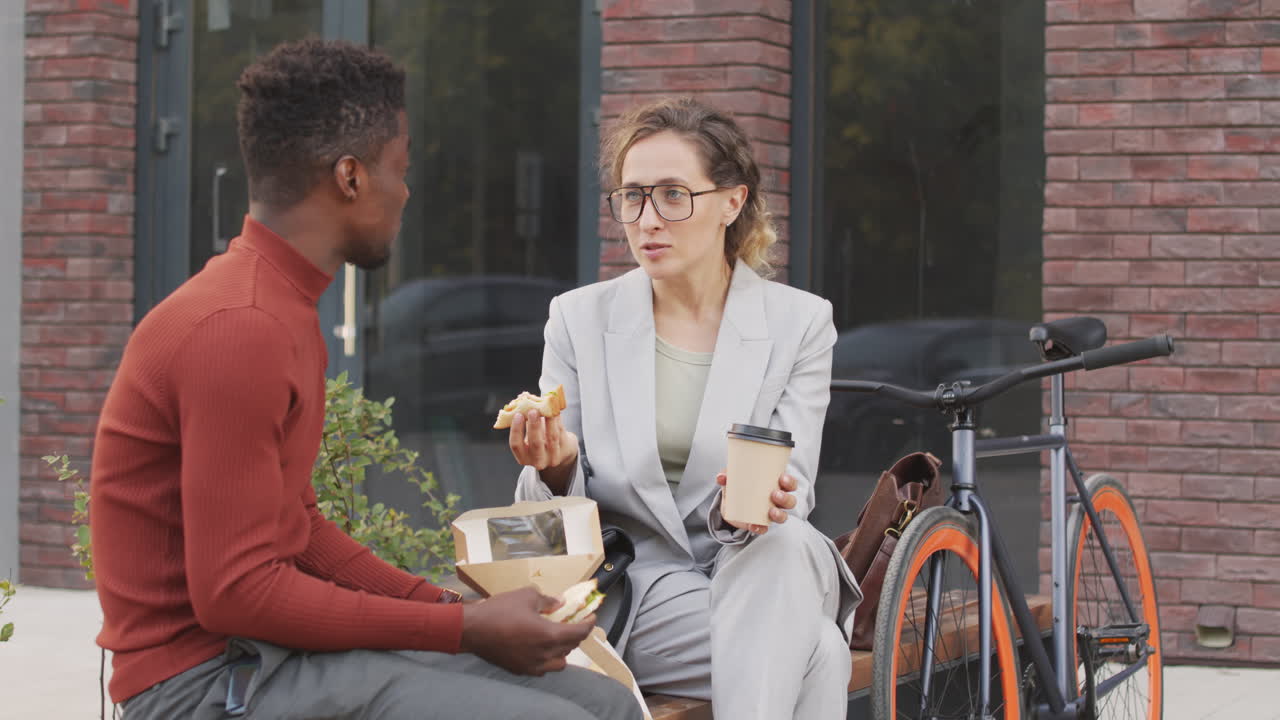 Business Couple during Lunch Break Outdoors