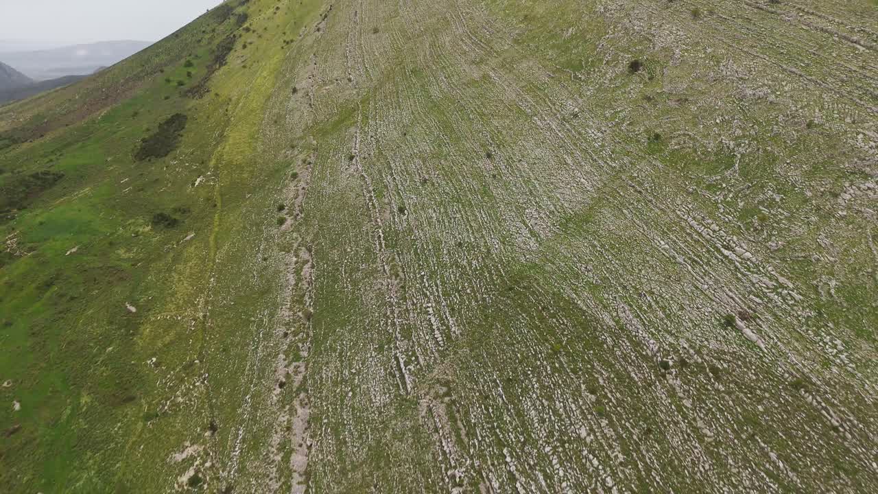 Albanian hilly landscape with lush greenery viewed from above